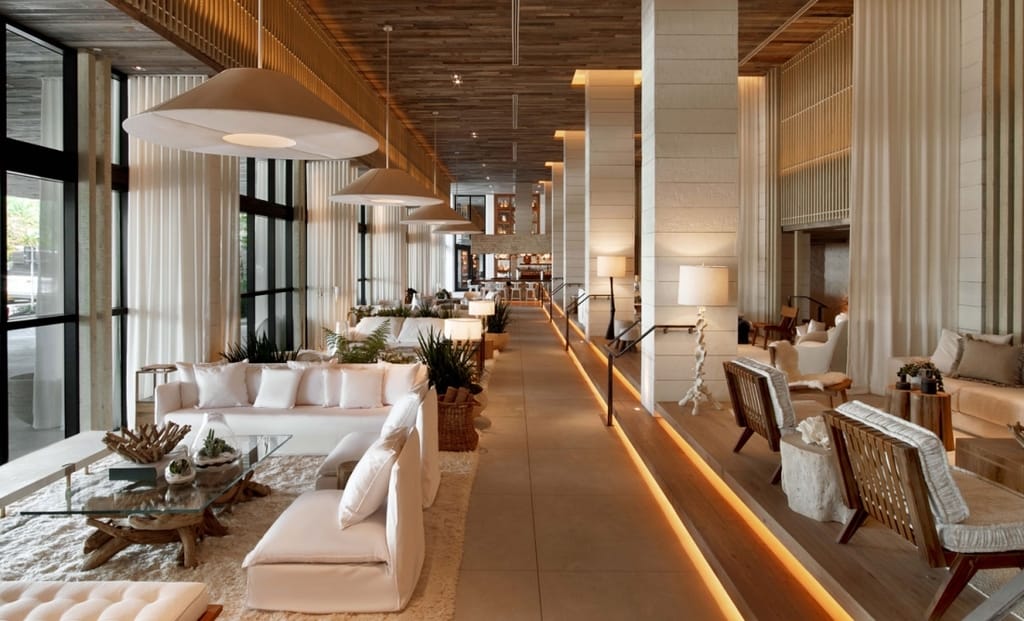 The airy, plant-filled lobby of 1 Hotel South Beach